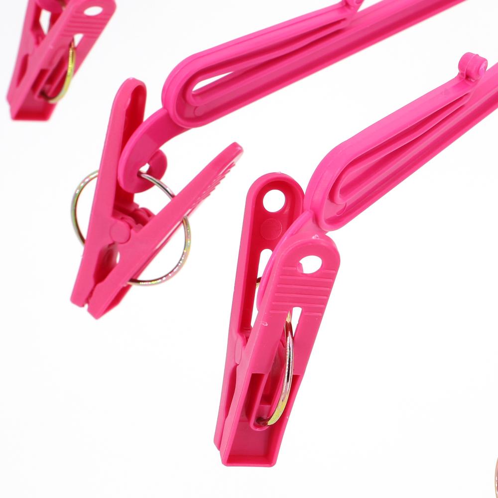 Lot de 2 séchoirs à linge pliables à suspendre avec 10 pinces en plastique rose