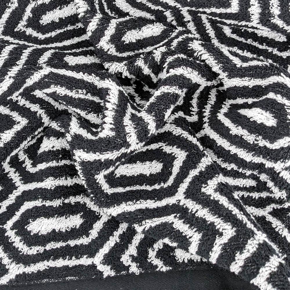 Parure de bain SYMETRIE 100% coton Alvéoles - 7 pièces noir